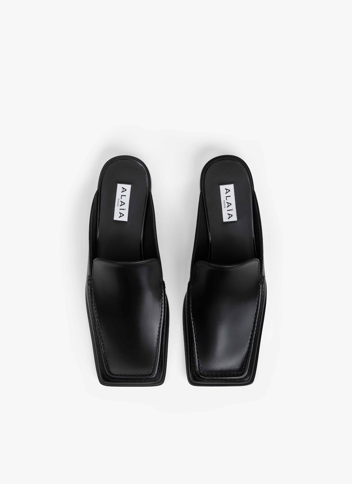 SQUARE LOAFER MULES IN CALFSKIN ALAÏA BLACK SQUARE LOAFER MULES IN CALFSKIN